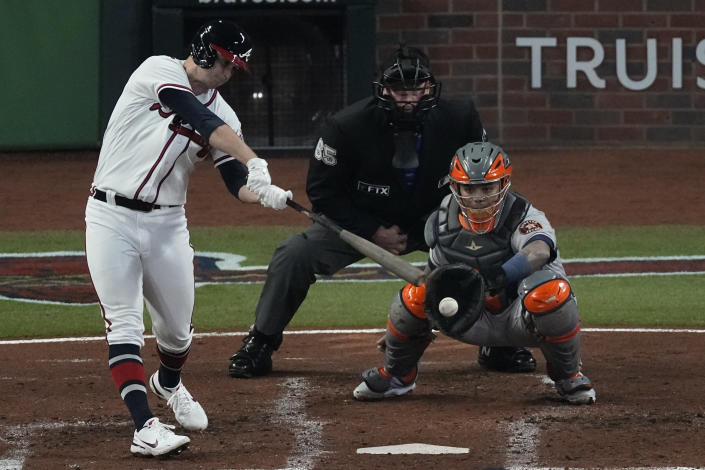 Atlanta Braves starting pitcher Tucker Davidson strikes out during the second inning in Game 5 of baseball's World Series between the Houston Astros and the Atlanta Braves Sunday, Oct. 31, 2021, in Atlanta. (AP Photo/John Bazemore)