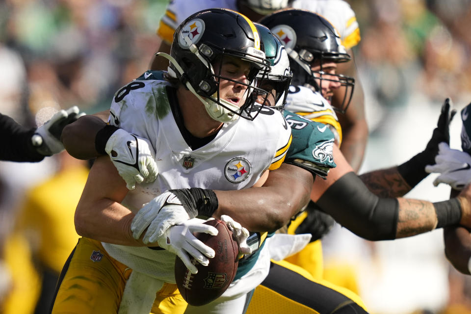 Philadelphia Eagles defensive tackle Javon Hargrave sacks Pittsburgh Steelers quarterback Kenny Pickett (8) during the first half of an NFL football game between the Pittsburgh Steelers and Philadelphia Eagles, Sunday, Oct. 30, 2022, in Philadelphia. (AP Photo/Matt Slocum)