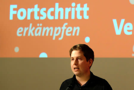 Kevin Kuehnert, head of the German Social DemocratsÕ (SPD) youth wing urges delegates to the partyÕs regional congress in the state of Saxony Anhalt not to back another four years of coalition with German Chancellor Angela Merkel during a meeting in Wernigerode, Germany, January 13, 2018. REUTERS/Thomas Escritt