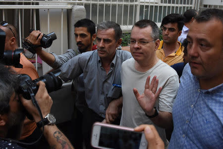 U.S. pastor Andrew Brunson reacts as he arrives at his home after being released from the prison in Izmir, Turkey July 25, 2018. Demiroren News Agency, DHA via REUTERS