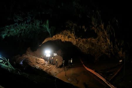 Soldiers walk after 12 soccer players and their coach were rescued near Tham Luang cave complex in the northern province of Chiang Rai, Thailand, July 10, 2018. REUTERS/Soe Zeya Tun