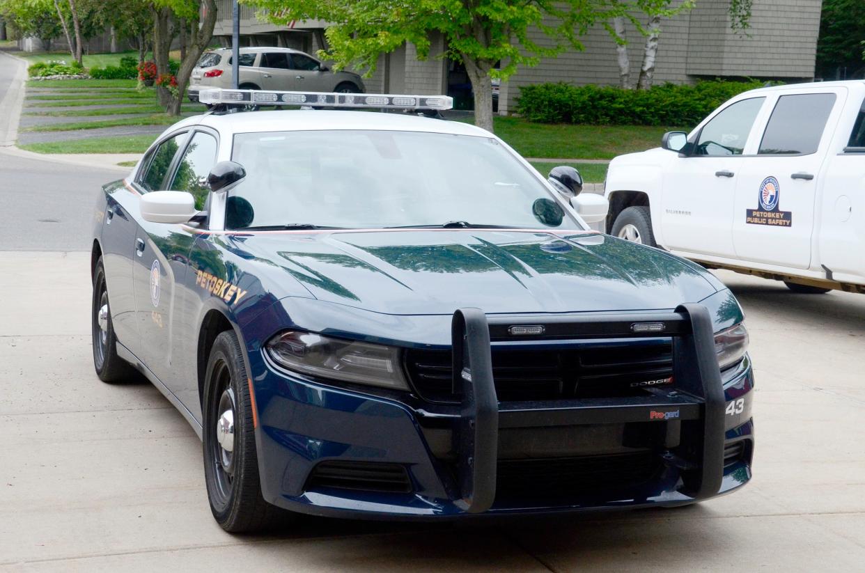 A Petoskey Department of Public Safety police vehicle is shown.