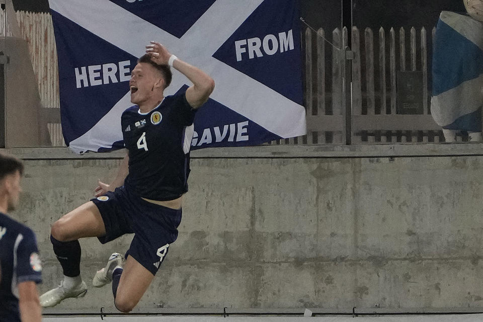 Scotland's Scott McTominay celebrates after scoring against Cyprus during the Euro 2024 group A qualifying soccer match between Cyprus and Scotland at AEK arena stadium in Larnaca, Cyprus, Friday, Sept. 8, 2023. (AP Photo/Petros Karadjias)