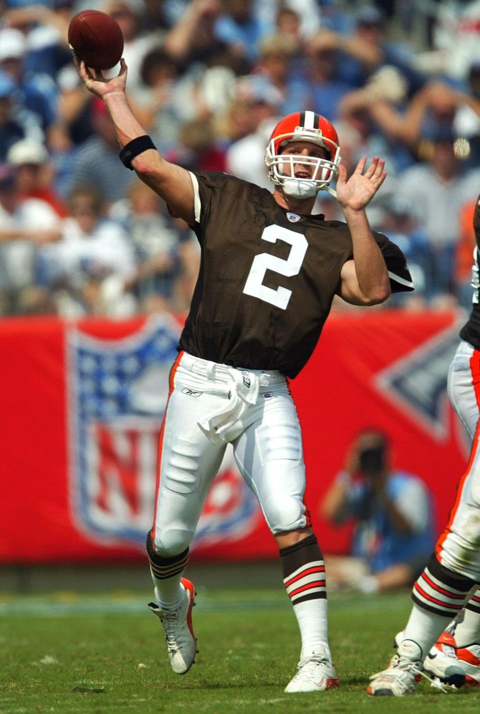 Browns quarterback Tim Couch throws against the Titans in the second quarter, Sunday, Sept. 22, 2002 in Nashville, Tenn. Couch passed for 326 yards and three touchdowns in the Browns' 31-28 overtime win over the Titans. (AP Photo/John Russell)