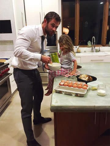 Elsa Patkay/Instagram Chris Hemsworth cooking with daughter