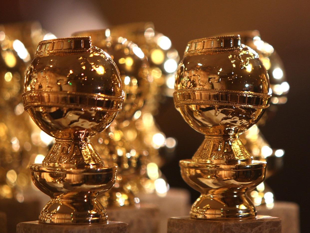 Golden Globe statuettes on display (Getty Images)