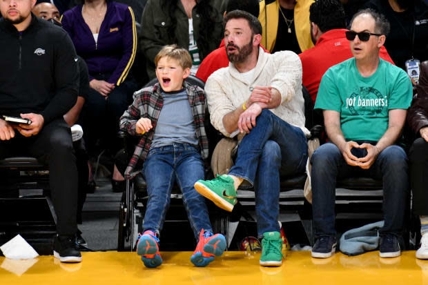 LOS ANGELES, CALIFORNIA - DECEMBER 13: Ben Affleck and his son Samuel Garner Affleck attend a basketball game between the Los Angeles Lakers and the Boston Celtics at Crypto.com Arena on <a href="https://parade.com/living/december-holidays-observances" rel="nofollow noopener" target="_blank" data-ylk="slk:December;elm:context_link;itc:0;sec:content-canvas" class="link ">December</a> 13, 2022 in Los Angeles, California. (Photo by Allen Berezovsky/Getty Images)<p><a href="https://www.gettyimages.com/detail/1448974330" rel="nofollow noopener" target="_blank" data-ylk="slk:Allen Berezovsky/Getty Images;elm:context_link;itc:0;sec:content-canvas" class="link ">Allen Berezovsky/Getty Images</a></p>