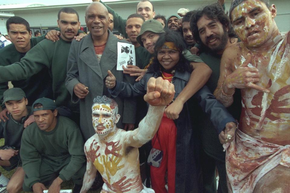 At Silverwater prison in Sydney in 2000 on a visit with Ruby Hunter and Indigenous dancers - John van Hasselt/Sygma via Getty Images