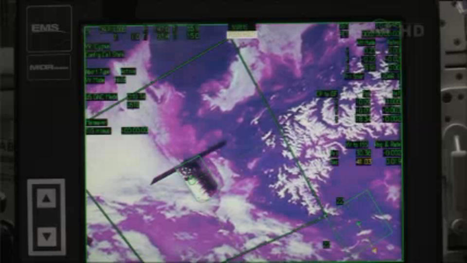 In this image from video provided by NASA the Cygnus spacecraft resupply vehicle approaches the International Space Station early Sunday Jan. 12, 2013. Cygnus is expected to arrive on the station later this morning. The spacecraft is packed with 3,000 pounds of equipment and experiments provided by NASA, as well as food and even some ants for an educational project. Christmas presents also are on board for the six space station residents; the delivery is a month late. (AP Photo/NASA)