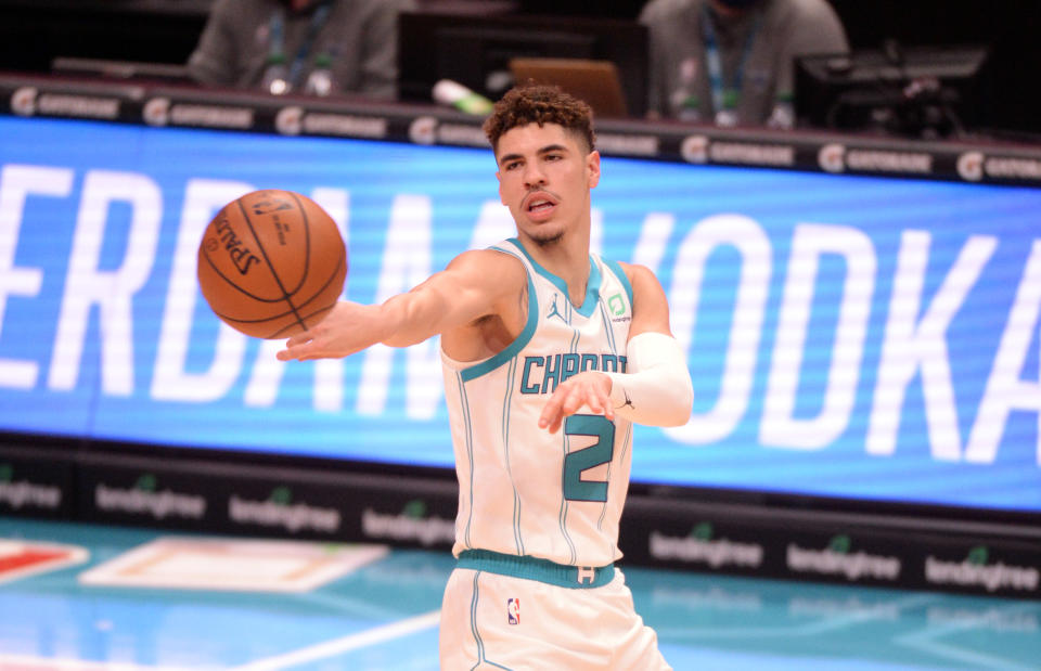 Dec 27, 2020; Charlotte, North Carolina, USA;  Charlotte Hornets guard LaMelo Ball (2) passes during the second half against the Brooklyn Nets at the Spectrum Center. Hornets won 106-104. Mandatory Credit: Sam Sharpe-USA TODAY Sports