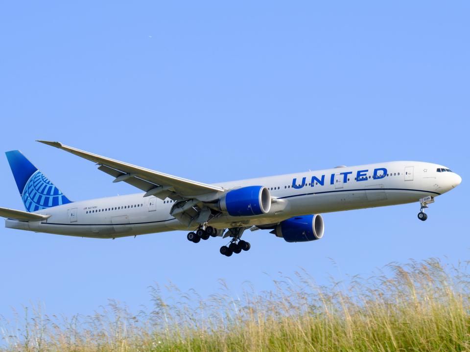 A United Airlines plane in flight.