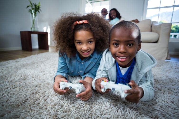 <span class="caption">Video games can help kids to work as a team.</span> <span class="attribution"><span class="source">Shutterstock</span></span>