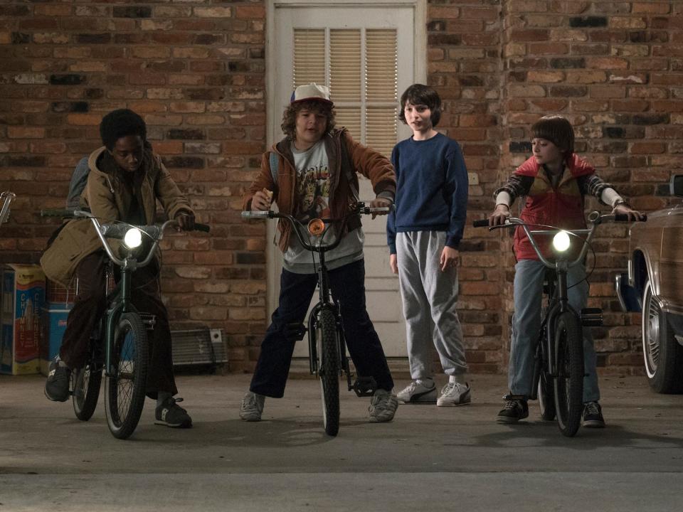 Will Lucas Dustin Mike Stranger Things boys biking 