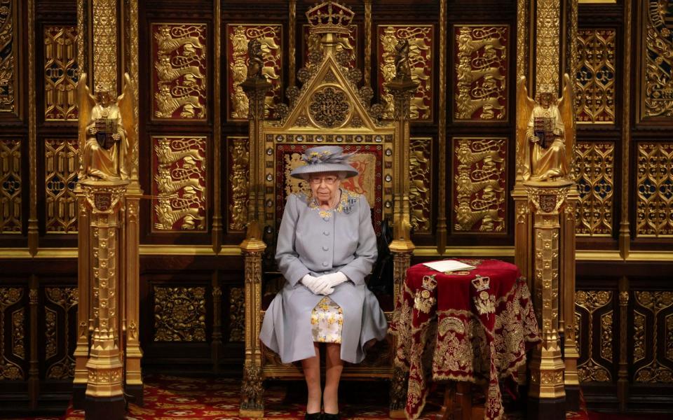 The Queen wearing Angela Kelly's design at the State Opening of Parliament on May 11 - Getty