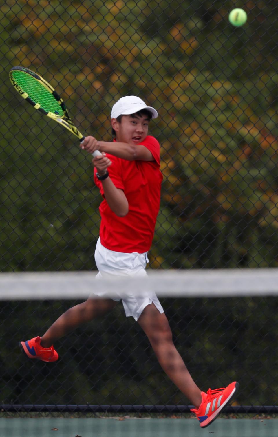 West Lafayette Gavin Ruan hits the ball during the IHSAA boy’s tennis sectional final against Harrison Andrew Kang, Thursday, Sept. 28, 2023, at Harrison High School in West Lafayette, Ind. West Lafayette won 3-2.