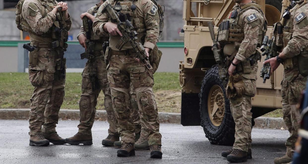 Members of the Canadian Special Operations Forces Command wait outside a change of command ceremony in Ottawa on April 25, 2018. (Patrick Doyle/Canadian Press - image credit)