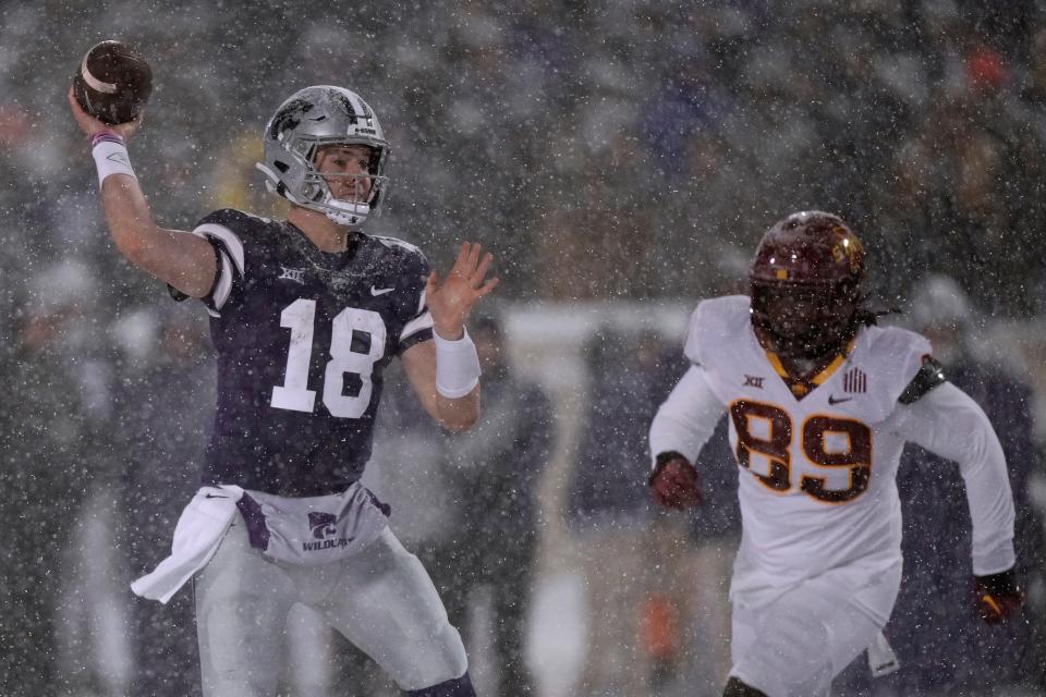 Kansas State quarterback Will Howard (18) throws a pass against Iowa State in the 2023 regular-season finale at Bill Snyder Family Stadium. Howard announced Thursday that he has committed to play next season at Ohio State.