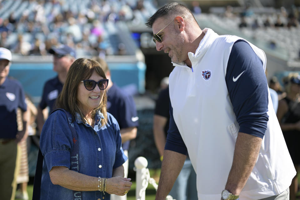 FILE - Tennessee Titans controlling owner Amy Adams Strunk talks with head coach Mike Vrabel before an NFL football game against the Jacksonville Jaguars, Sunday, Nov. 19, 2023, in Jacksonville, Fla. Strunk wants a fresh approach to compete in the NFL, so she fired coach Vrabel on Tuesday morning, Jan. 9, 2024, after six seasons and losing 18 of the past 24 games. (AP Photo/Phelan M. Ebenhack, File)