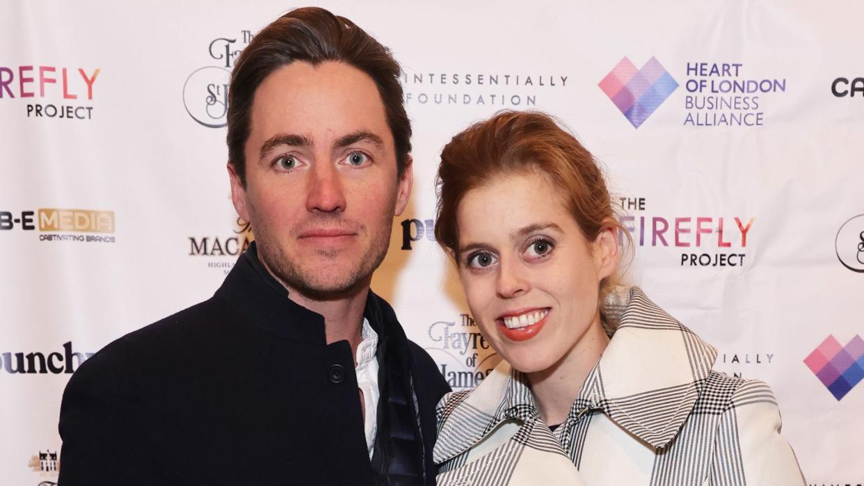 Edoardo Mapelli (L) Mozzi and Princess Beatrice of York attend The Fayre of St James's Christmas Carol 