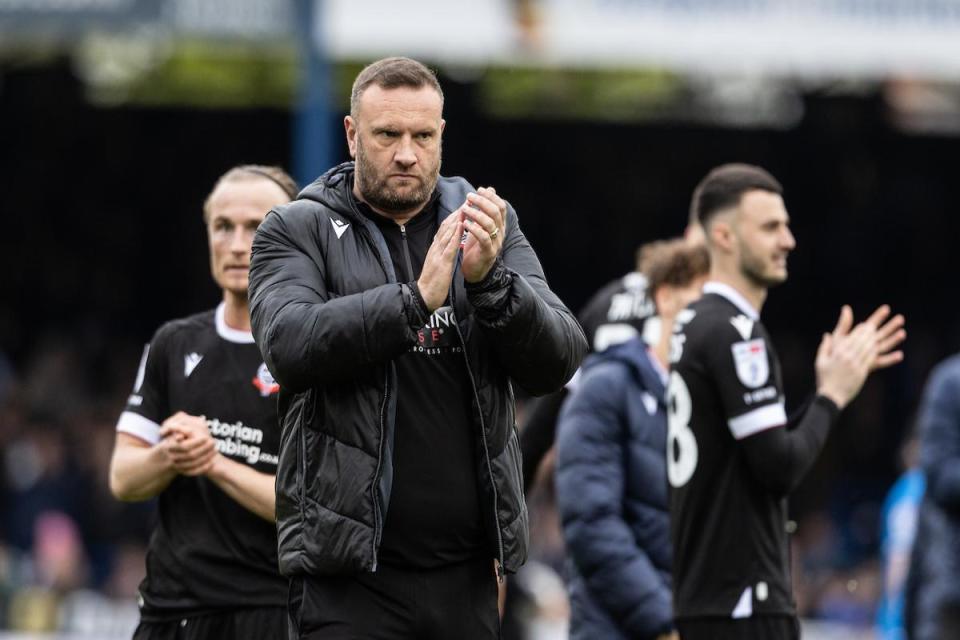 Ian Evatt applauds the fans after the final whistle at Peterborough <i>(Image: Camerasport)</i>