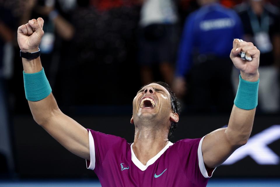 FILE - Rafael Nadal, of Spain, celebrates his win over Daniil Medvedev, of Russia, in the men's singles final at the Australian Open tennis championships in Melbourne, Australia, Jan. 31, 2022. (AP Photo/Hamish Blair, File)