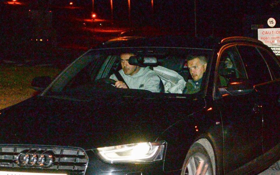 Royal Marine Alexander Blackman crouches down in the back of a car as he leaves Erlestoke Prison - Credit: PA