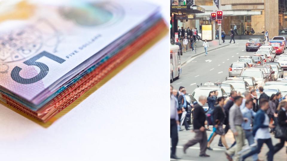 Close up of Australian cash, pedestrians in Sydney. 