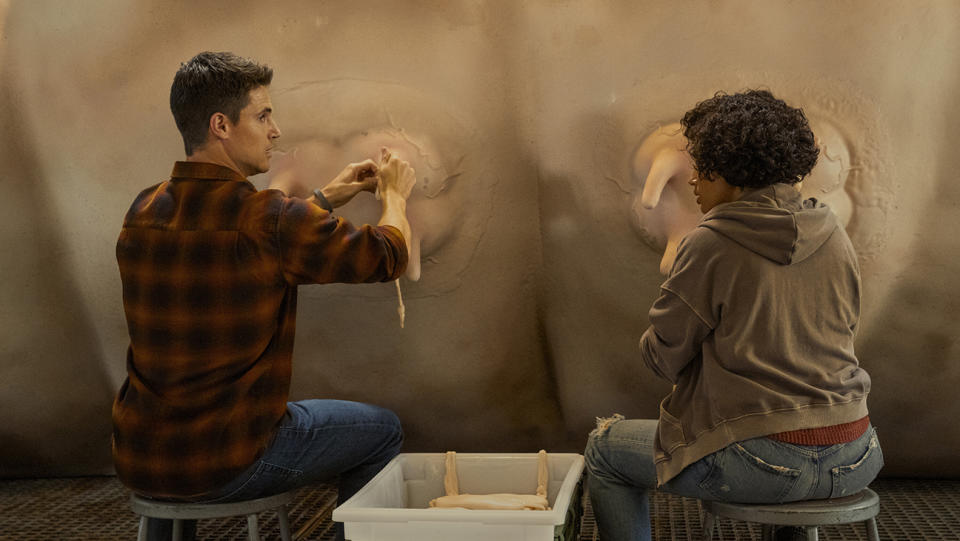 Robbie Amell and Andy Allo