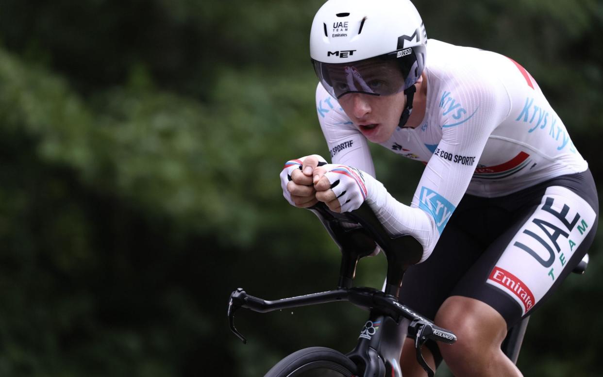 Slovenia's Tadej Pogacar wearing the best young's white jersey rides during the 20th stage of the 107th edition of the Tour de France - KENZO TRIBOUILLARD/AFP via Getty Images