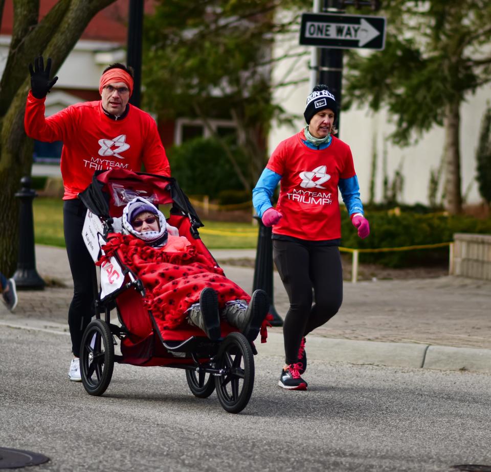 MyTeam Triumph makes it possible for disabled people to participate in athletic events, including Holland's St. Paddy's Day Leprechaun Chase.