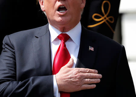 U.S. President Donald Trump participates in a "celebration of America" event on the South Lawn of the White House in Washington, U.S., June 5, 2018. REUTERS/Carlos Barria