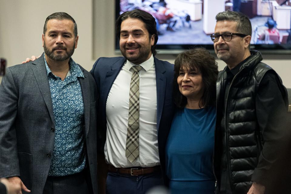 Newly elected District 2 city Rep. Josh Acevedo takes photos with his friends and family after he is sworn in by Judge Josh Herrera on Tuesday, Jan. 30, 2024, at El Paso City Hall.