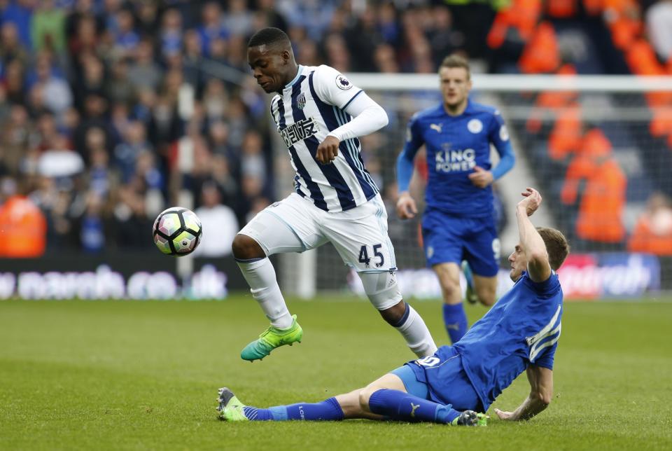 <p>West Bromwich Albion’s Jonathan Leko in action with Leicester City’s Andy King </p>