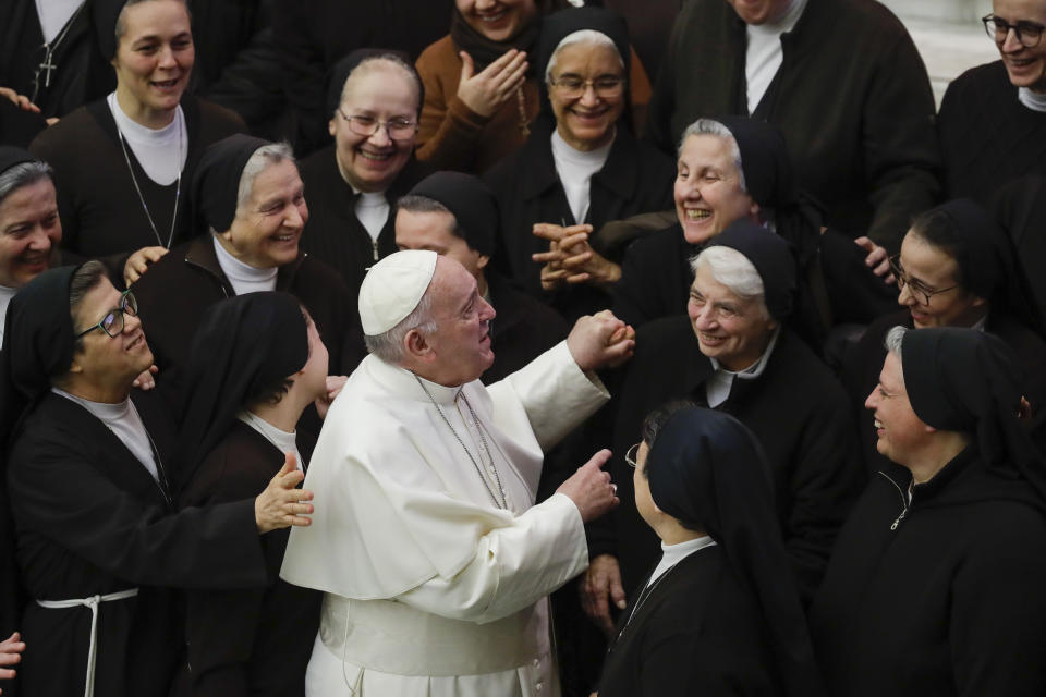 Pope Francis greets a group of nuns during his weekly general audience, in Paul VI Hall at the Vatican, Wednesday, Jan. 15, 2020. (AP Photo/Alessandra Tarantino)