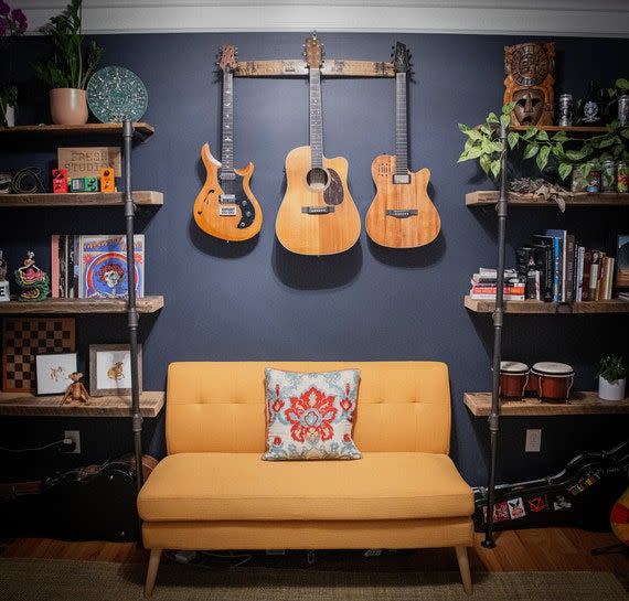<p><strong>SkullCreekDesigns</strong></p><p>etsy.com</p><p><strong>$45.00</strong></p><p>Treat the musician in your life to a tasteful rack for their guitars. This hanger puts their favorite instruments on display, turning the living room into a gallery of the arts (or rock 'n' roll museum).</p>