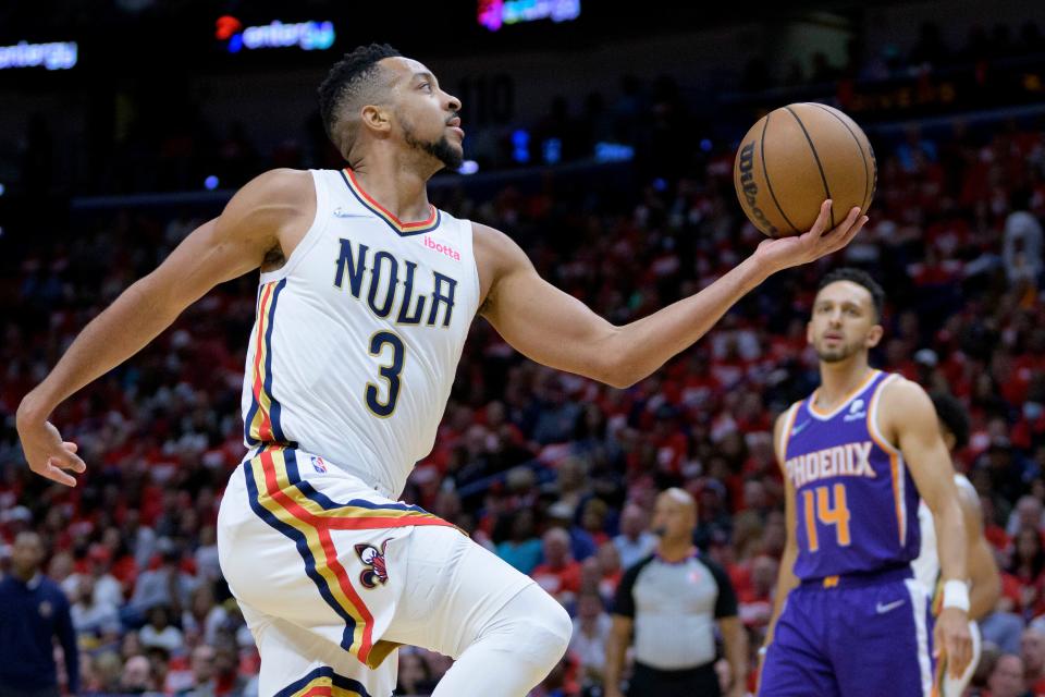 CJ McCollum goes up to shoot against the Phoenix Suns.