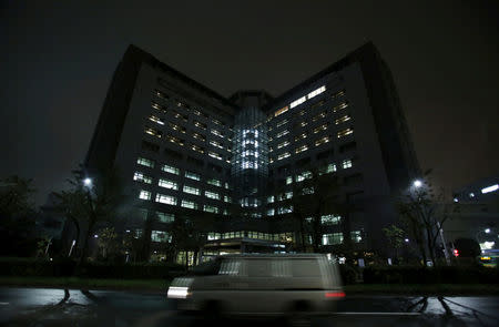 FILE PHOTO: A van is seen on a road in front of Tokyo Regional Immigration Bureau which includes the Tokyo detention center in Tokyo, Japan, December 2, 2015. REUTERS/Yuya Shino/File Photo