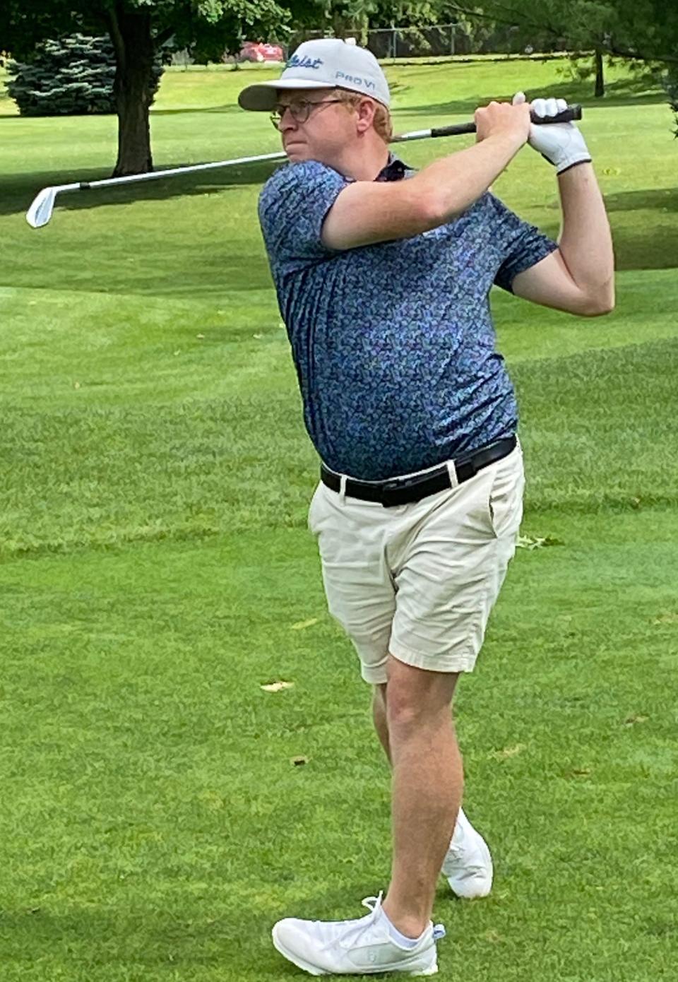 South Bend's Kyle Meihofer tees off the par-3, 230-yard 14th hole at Erskine Park Golf Saturday in Saturday's rain-delayed third round of the 99th Greater South Bend Men's Metro golf championships. Meihofer shot a one-under-par 71 and was at three-over 217, three strokes behind leader Satchel Pierce heading into Sunday's final round at Erskine Park.