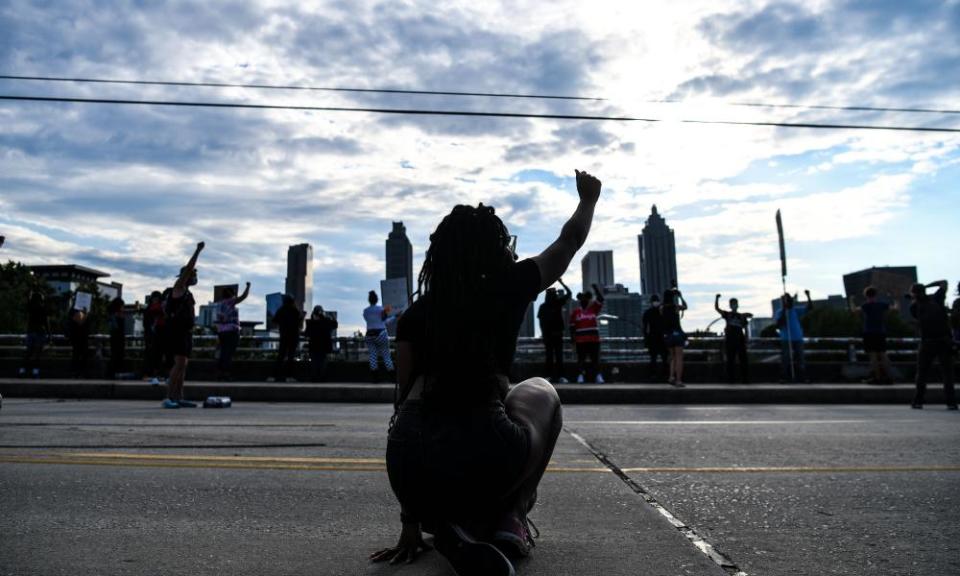 Protesters mark Juneteenth, 2020, in Atlanta, Georgia; the US marks the end of slavery by celebrating with an annual unofficial holiday.