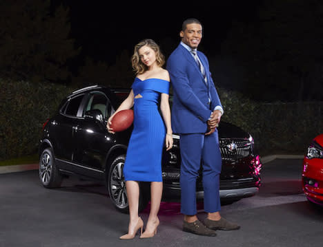Miranda Kerr and Cam Newton teamed up for Buick's 2017 Super Bowl ad. (Photo: Getty Images)