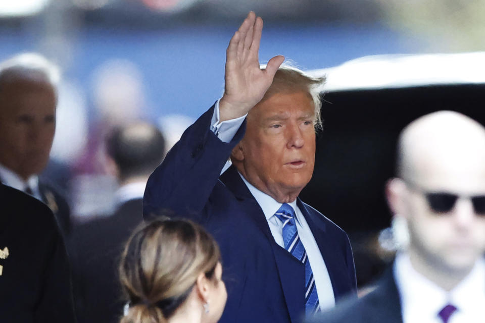 Former President Donald Trump, leaves Trump Tower for Manhattan Criminal Court Tuesday, April 16, 2024, in New York. Trump is set to return to court as a judge works to find a panel of jurors who'll decide whether the former president is guilty of criminal charges alleging he falsified business records to cover up a sex scandal during the 2016 campaign. (AP Photo/Noah K. Murray)