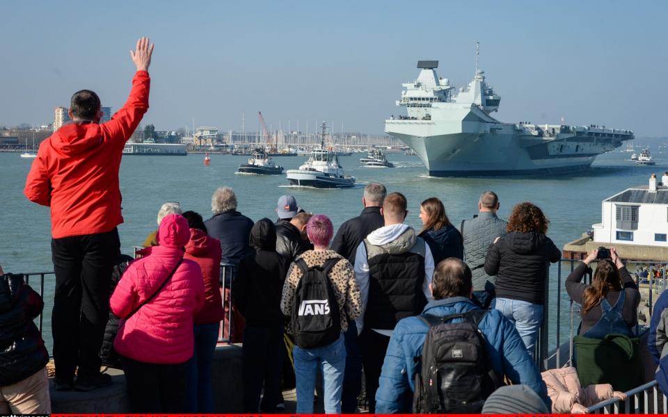 Crowds gathered as the aircraft carrier set off from the Portsmouth Naval Base