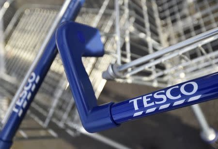 Shopping trolleys are seen at a Tesco supermarket in central London, December 9, 2014. REUTERS/Toby Melville