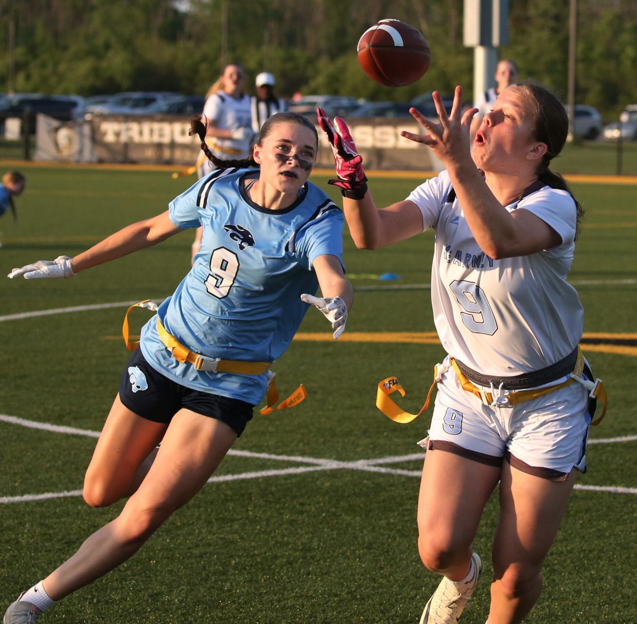 Bishop Kearney’s Nela Lopusanova makes a over-the-shoulder reception ahead of Gananda’s Emerson Paull during their Section V Class B2 Championship game Tuesday, May 21, 2024 at Monroe Community College.