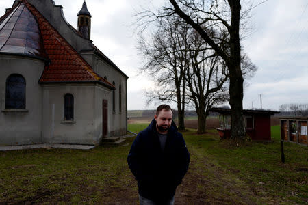 Mariusz Milewski, 28, walks at the Sanctuary of Mother of God in Wardegowo village, Poland, February 17, 2019. Picture taken February 17, 2019. REUTERS/Kacper Pempel