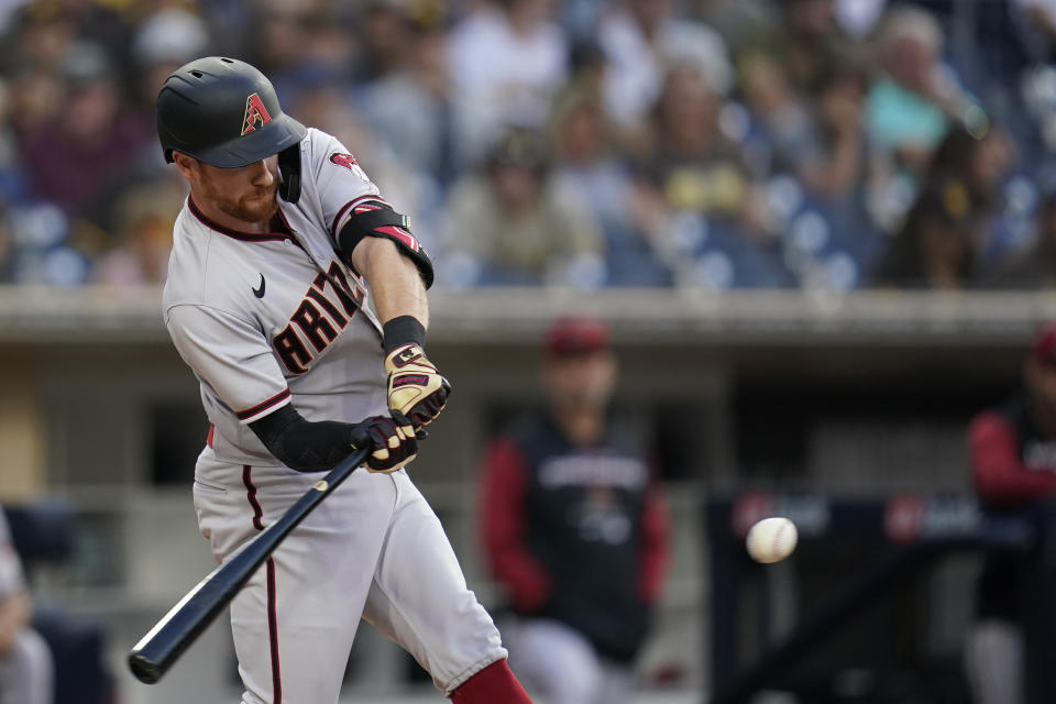 Arizona Diamondbacks' Jordan Luplow hits a two-run, in the park home run during the third inning of a baseball game against the San Diego Padres, Tuesday, June 21, 2022, in San Diego. (AP Photo/Gregory Bull)