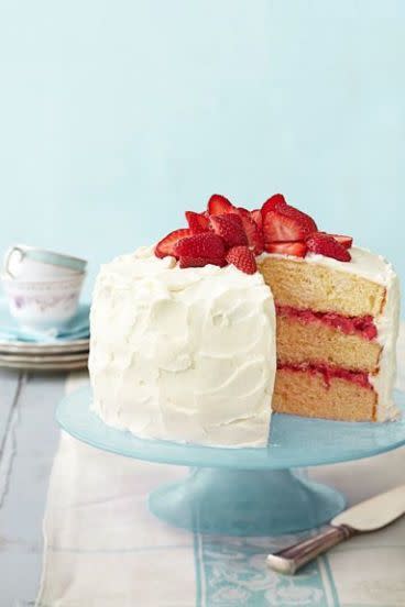 <p>This luscious vanilla cake, layered with fresh compote and frosted with sweet, cream cheese icing, is sure to become a family favourite.</p><p>Get the <a href="https://www.delish.com/uk/cooking/recipes/a30266732/strawberry-rhubarb-layer-cake-recipe-ghk0414/" rel="nofollow noopener" target="_blank" data-ylk="slk:Strawberry Rhubarb Layer Cake;elm:context_link;itc:0;sec:content-canvas" class="link ">Strawberry Rhubarb Layer Cake</a> recipe.</p>