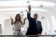 <p>President Donald Trump and first lady Melania Trump throw flower pedals while visiting the Pearl Harbor Memorial in Honolulu, Hawaii Friday, Nov. 3, 2017. Trump paid a solemn visit Friday to Pearl Harbor and its memorial to the USS Arizona, a hallowed place he said he had read about, discussed and studied but had never visited until just before opening his first official visit to Asia. (Photo: Andrew Harnik/AP) </p>
