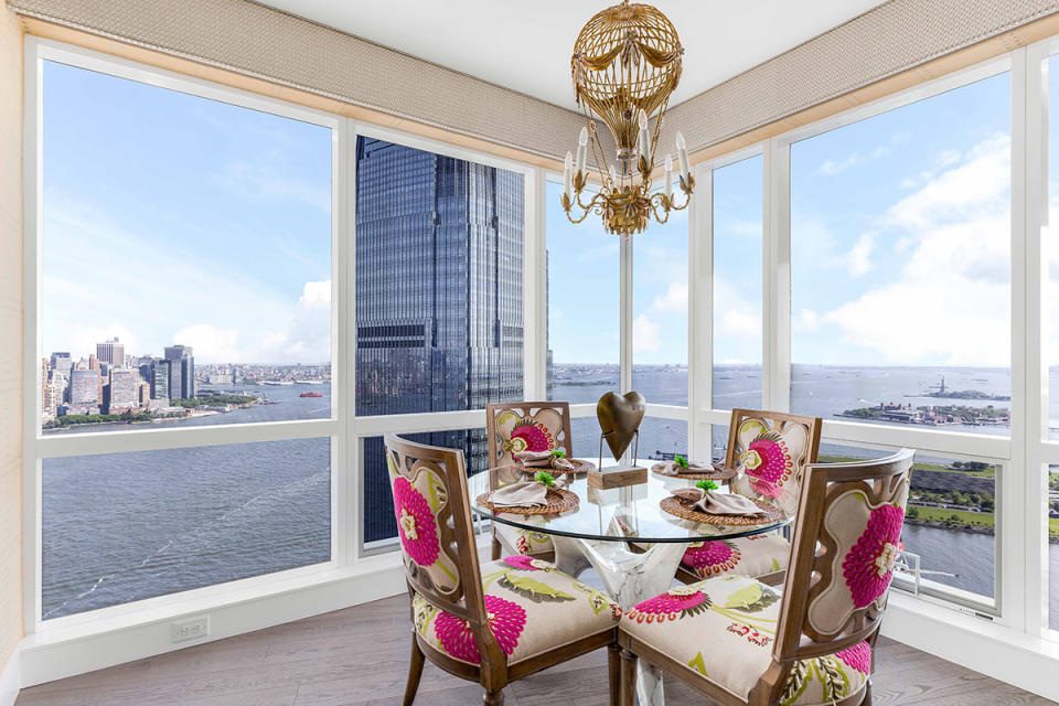 The penthouse’s high perch allows every room to float above the Hudson River.