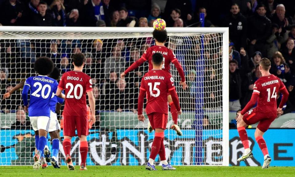 Mohamed Salah heads the ball against the bar after having his penalty saved by Leicester’s Kasper Schmeichel